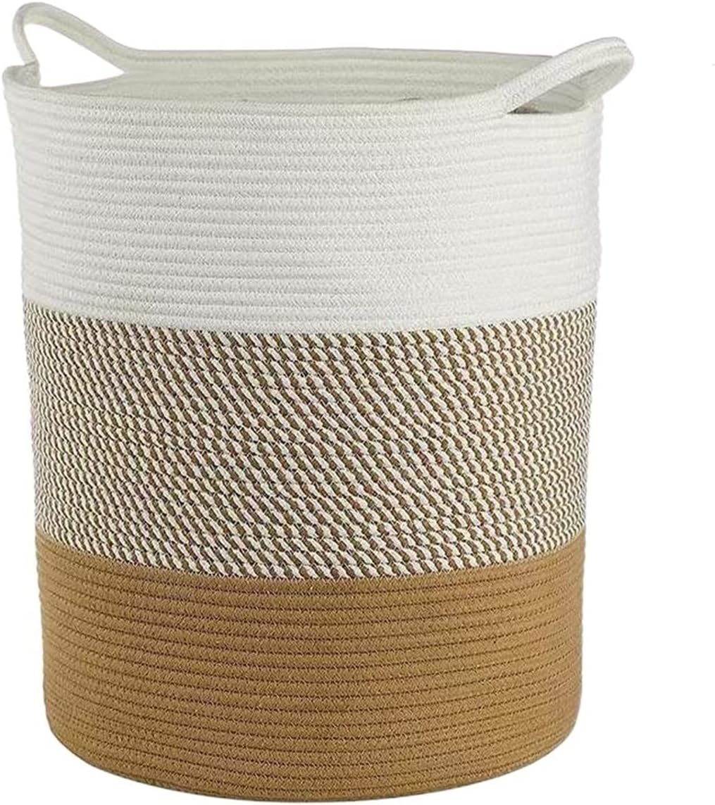 Ce panier a linge combine une poignee de prise en main avec une partie textile en coton